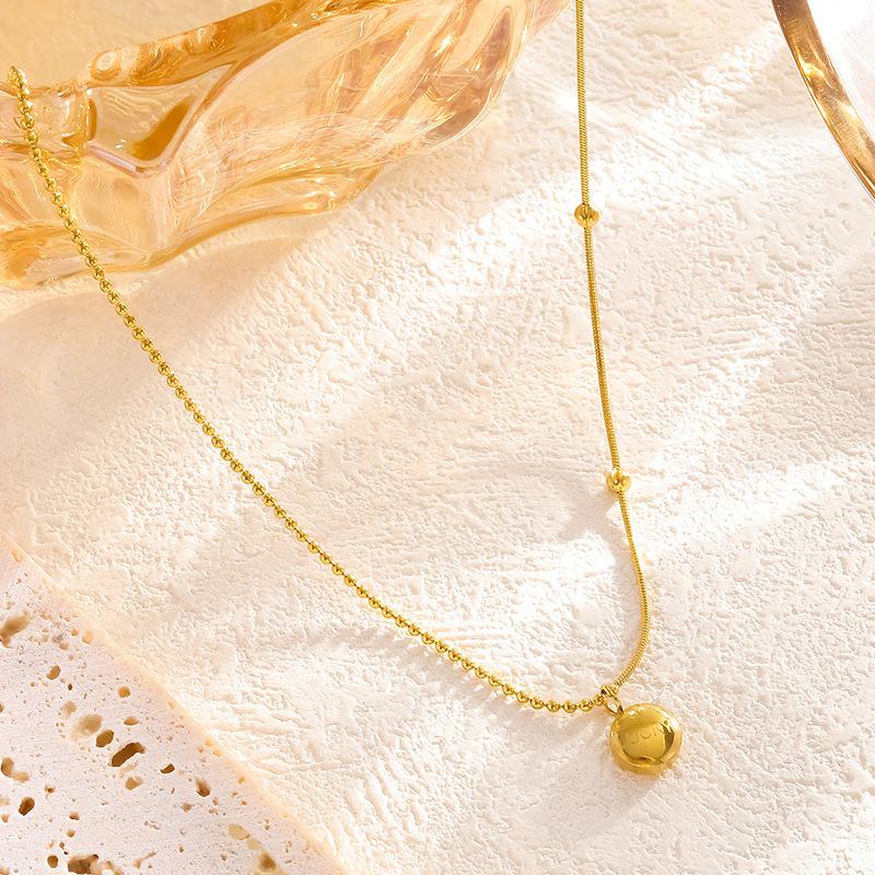 Niche Design Lucky Gold Bean Necklace with Round Bead Chain: European, American, and Korean Style with a Light Luxury Feel.