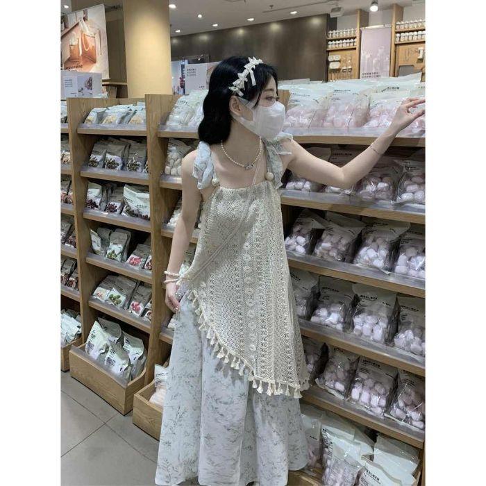 

Design sense niche irregular splicing fake two-piece floral suspender dress women s summer small fringed skirt S