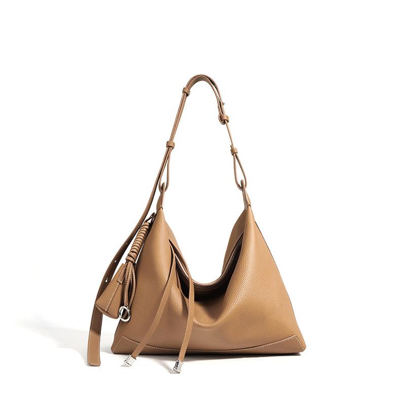 

Bag spring and summer design sense niche messenger bag first layer cowhide women s bag French high-end feeling underarm bag