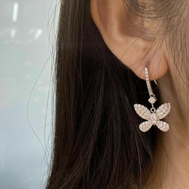 Cao Shis Douyin Schleifenohrringe, Diamant-Schmetterlingsdesign, Eleganter femininer Stil, Bezaubernde Voll-Diamant-Ohrringe.