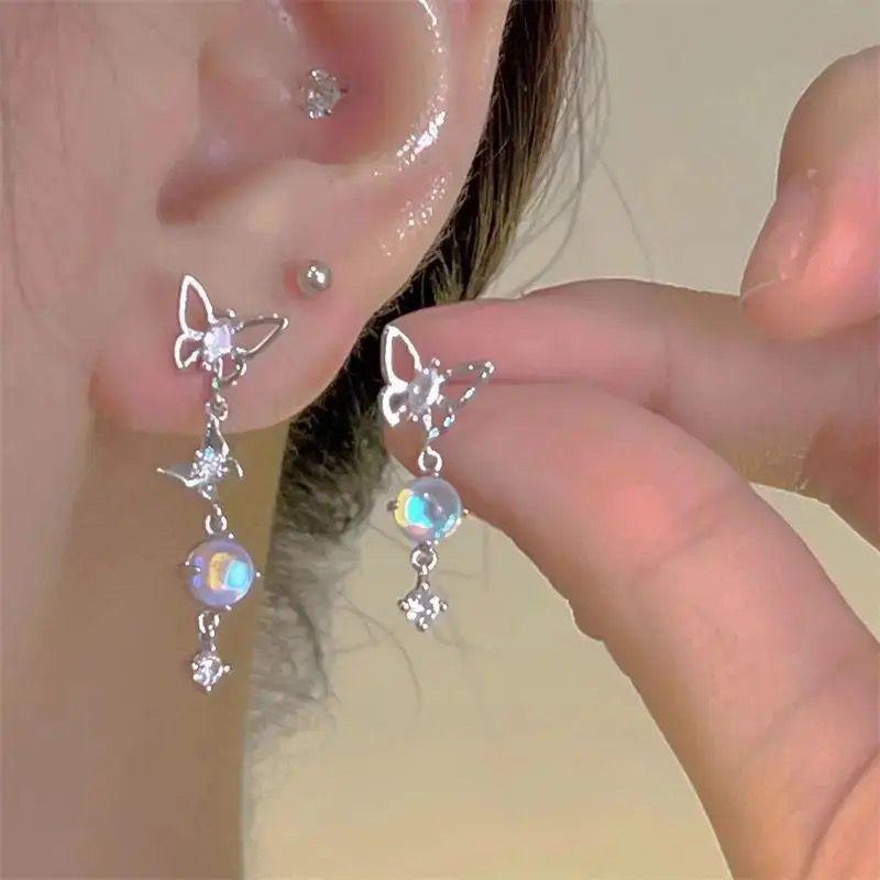 Star bow, zircon ear clips, female niche design, fashionable earrings, temperament, versatile, no ear piercings, mosquito coil disc, ear clips.