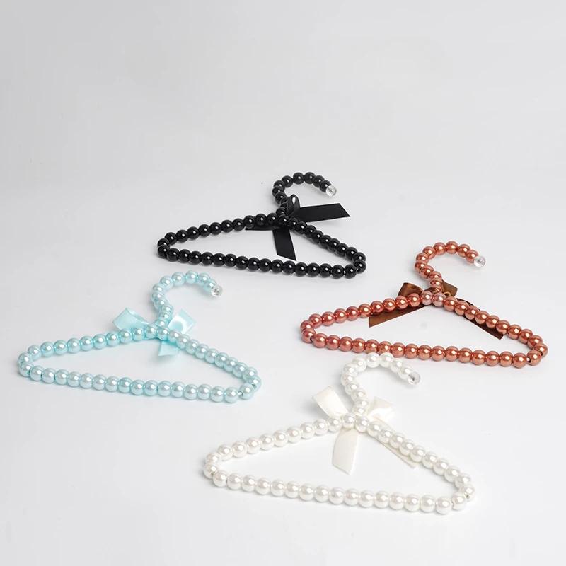 5pcs Baby Clothes Hanger Pearl Bow Rack Dog Hanger Plastic Pearl Bead Clothes Hangers Pet Cat Clothing Kid Hangers Organizer