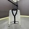 Trendy European Knit V-Neck Cardigan with Embroidered Patch and Contrasting Edges