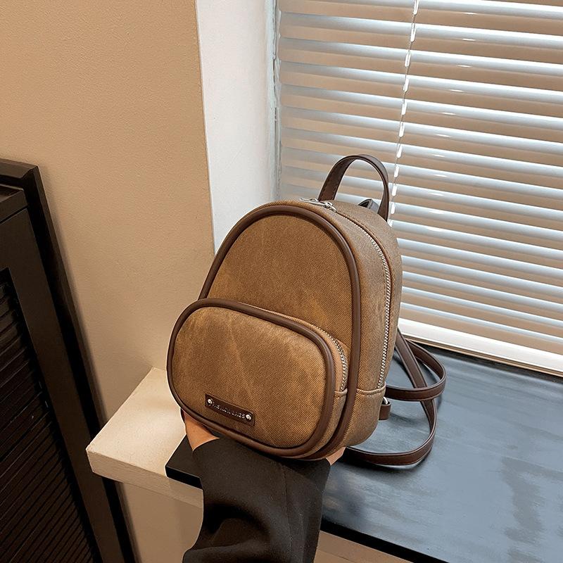 Schoolbag fashion mini small bag women's 1011 spring new trend foreign style backpack simple texture travel small backpack