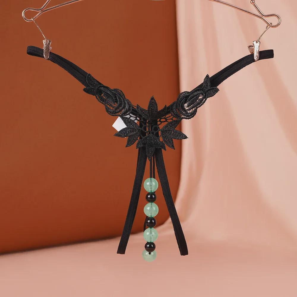 "Luminous Pearl Massage Open-Crotch Thong for Women: Sexy Nightclub Underwear"