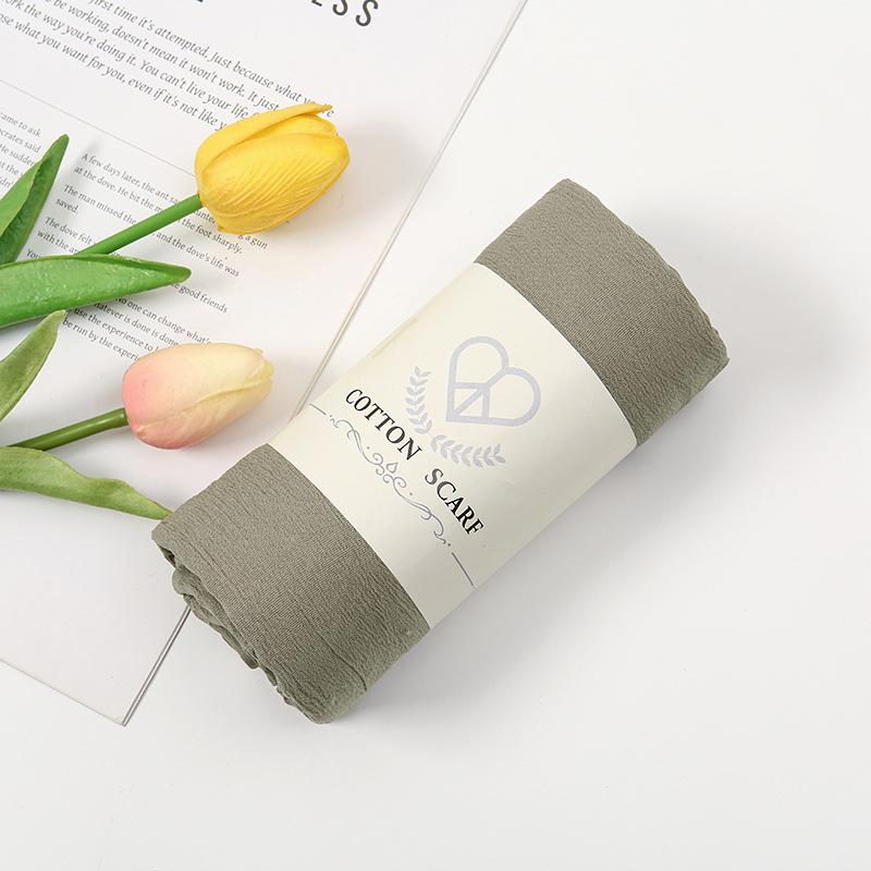 Autumn and winter new micro-elastic crumpled cotton blended long towel right angle lock edge polyester headscarf hot-selling solid color scarf