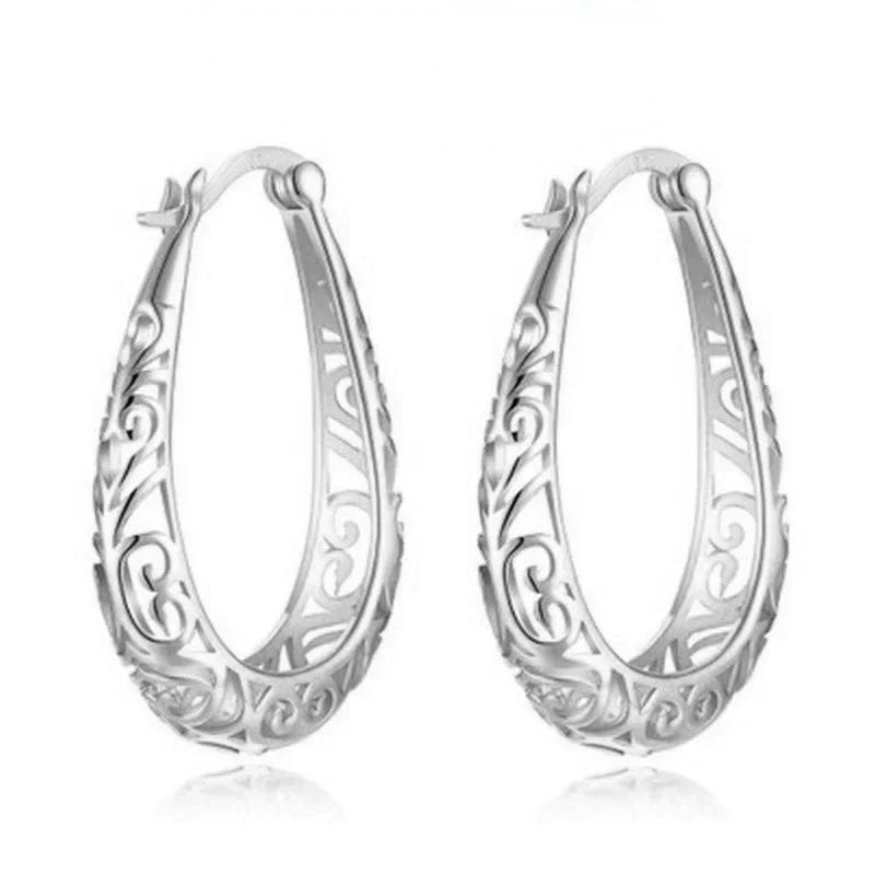 

Новые полые серьги в форме сердца с цветами, европейские и американские преувеличенные аксессуары для банкета, свадьбы, вечеринки, подарок серебряный