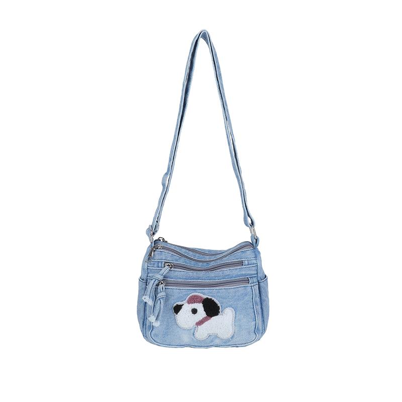 

Жіноча джинсова сумка з цуценям на плече/кросбоді світло-синій колір