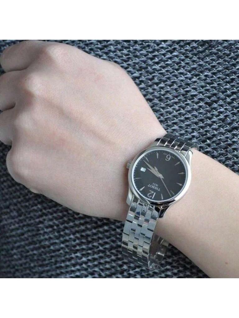 One Unit Available: Ultra-thin, Vintage-inspired Tradition Lady Design, Featuring Black Dial, Silver-tone Dauphine Hands, 316L T063.210.11.057.00