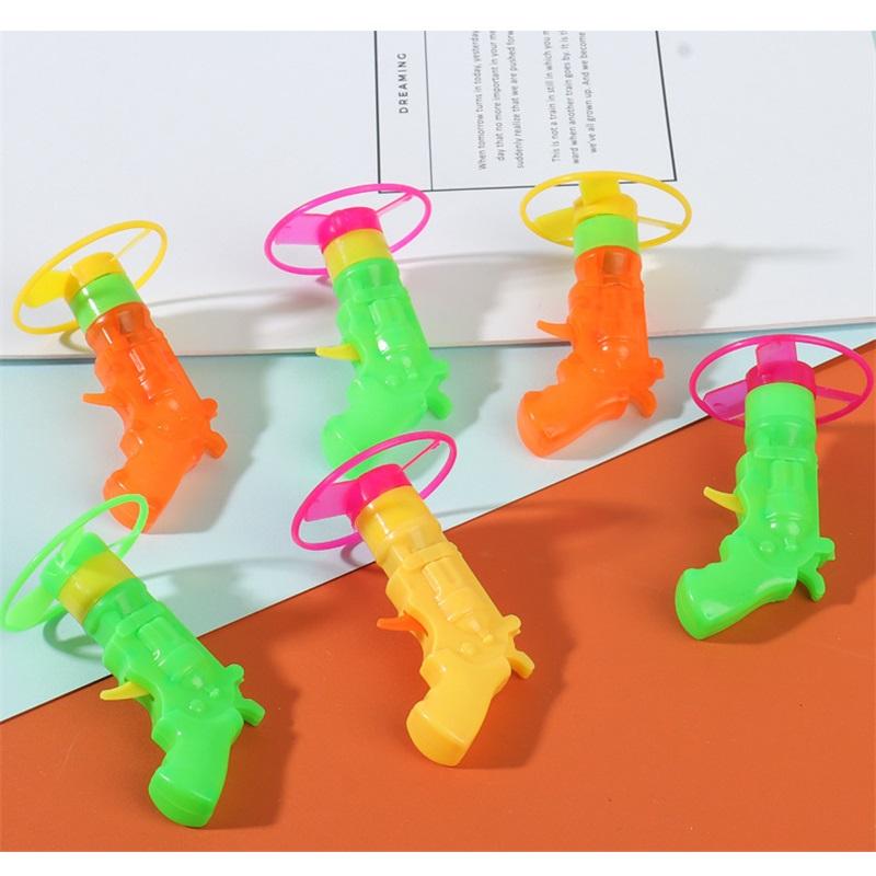 Drehmoment-Kreisel, kreativer Kinder-Pistolen-Kreisel startet rotierende kleine Kreisel, rotierende fliegende Untertasse Kreisel Kinderspielzeug