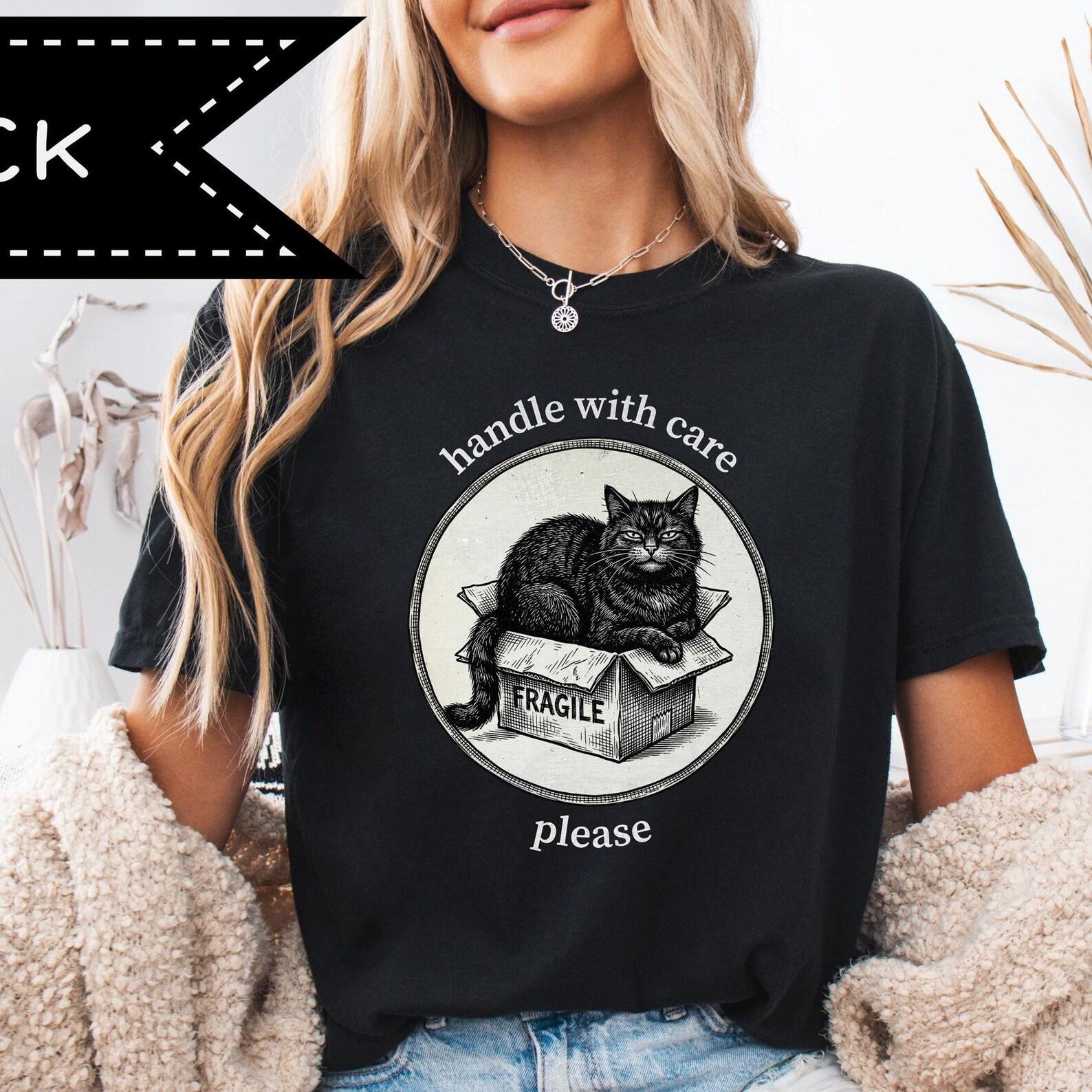 Cat in Box Graphic Tee, Handle With Care Illustration, Gothic Streetwear Style, Philosophical Humor Tee L