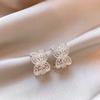 Hollow flower C-shaped zircon earrings light luxury high-end temperament stud earrings new earrings design sense niche
