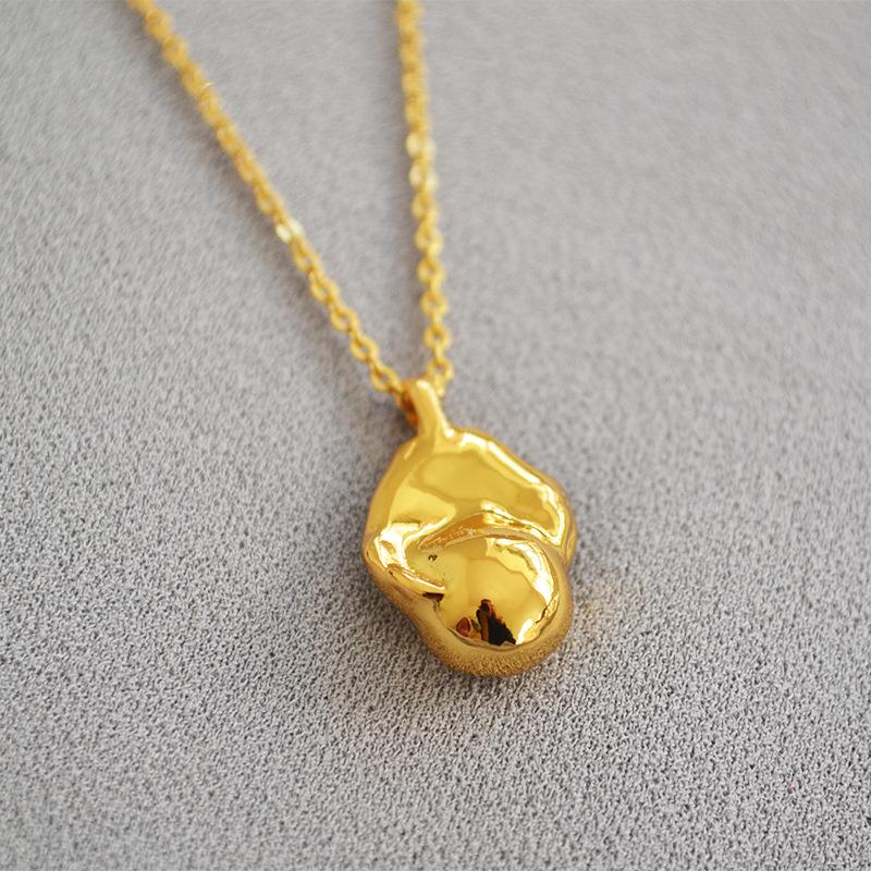 

Baroque Style Gilded Brass Freshwater Pearl Pendant Necklace