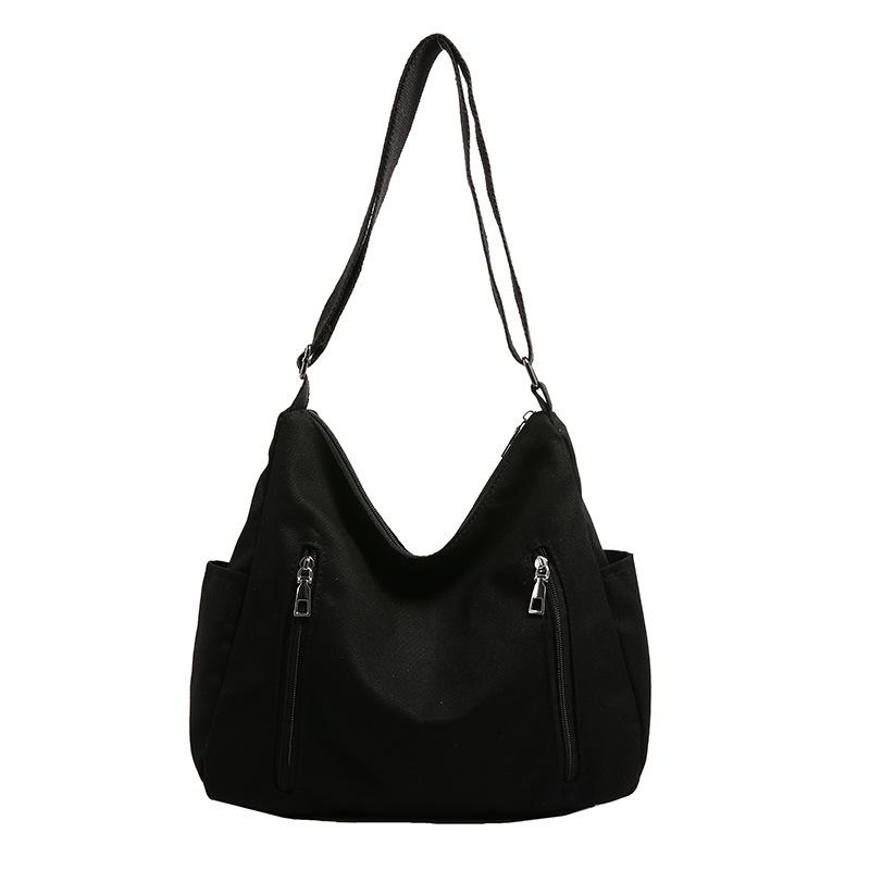 Neue einfarbige Damenhandtasche mit großem Fassungsvermögen, einfache lässige Tragetasche, trendige Mode, vielseitige Schulter-Umhängetasche