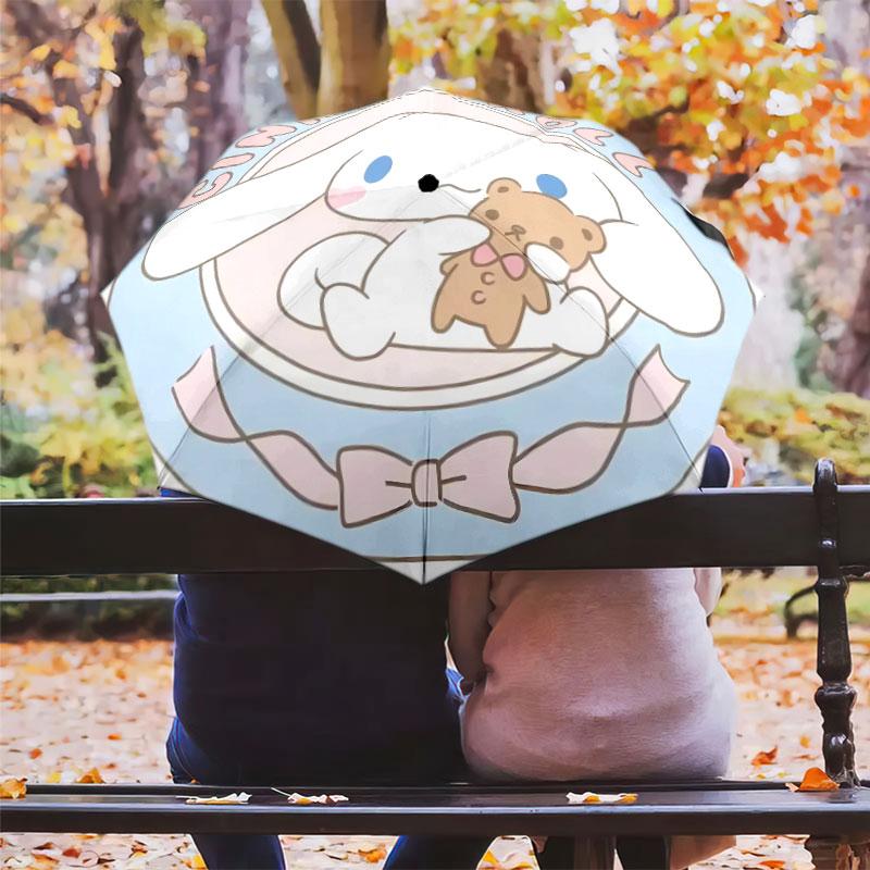 Portable travel umbrella with cute Sanrio character designs, UV-protective folding umbrella.