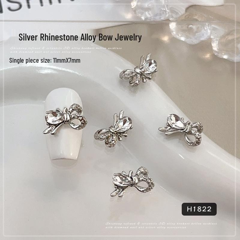 

Retro Silver Rhinestone Bow Nail Art Accessories 2025 – Trendy Wearable Nail Drill Design