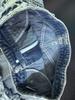 Shorts en jean déchirés taille haute à franges pour femmes style européen et américain 2024