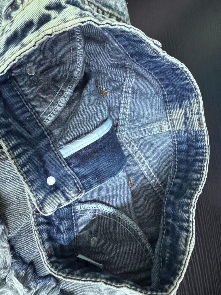Shorts en jean déchirés taille haute à franges pour femmes style européen et américain 2024
