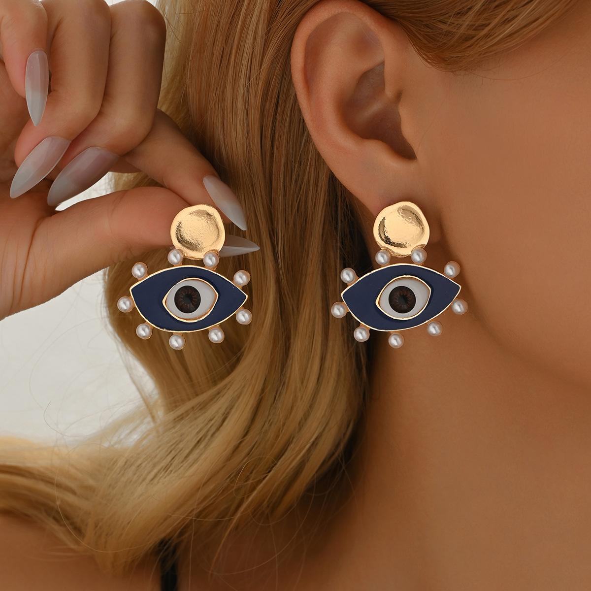 

Devil s Eye Earrings European and American Jewelry Light Luxury Retro Pearl Water Drop Earrings Women