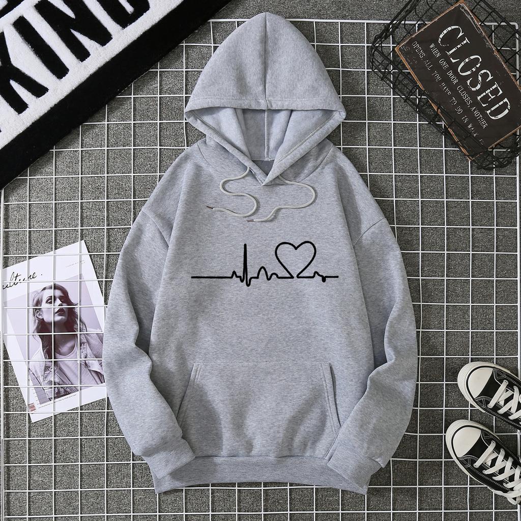 Nuovo top in velluto da donna autunno e inverno 2025 maglione largo a maniche lunghe con battito cardiaco