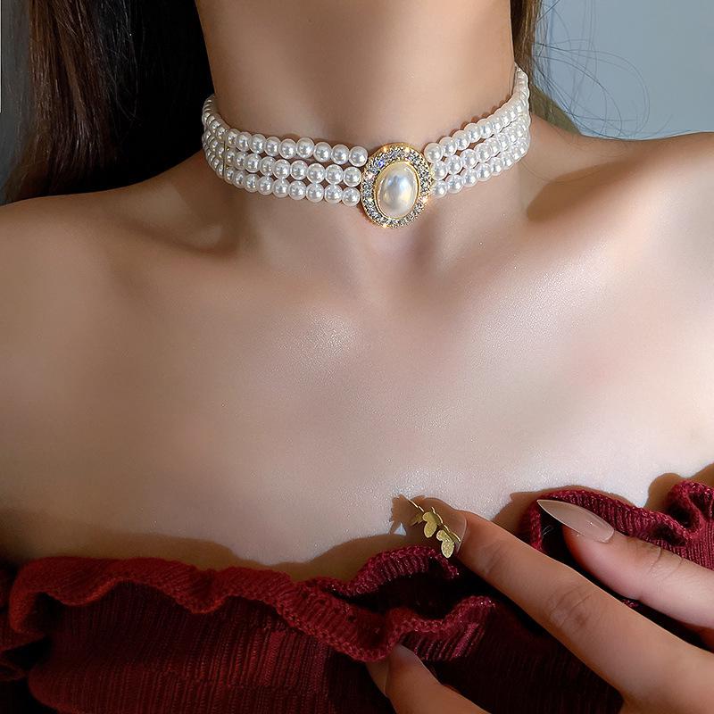 Women's Multi-Layer Pearl & Diamond Oval Necklace: Retro Hepburn Style, Light Luxury, Perfect for Sweaters and Dressy Outfits.