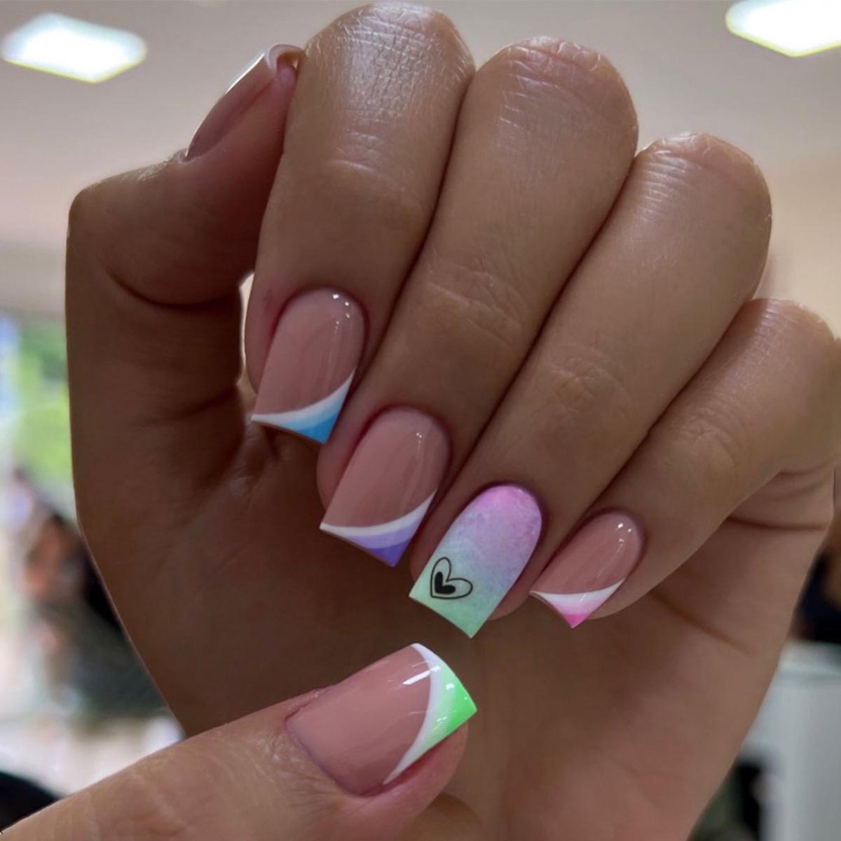 

Detachable medium-long square nails with slanted French tips, multicolor gradient, heart art; enhances hand whiteness, casual and wearable.