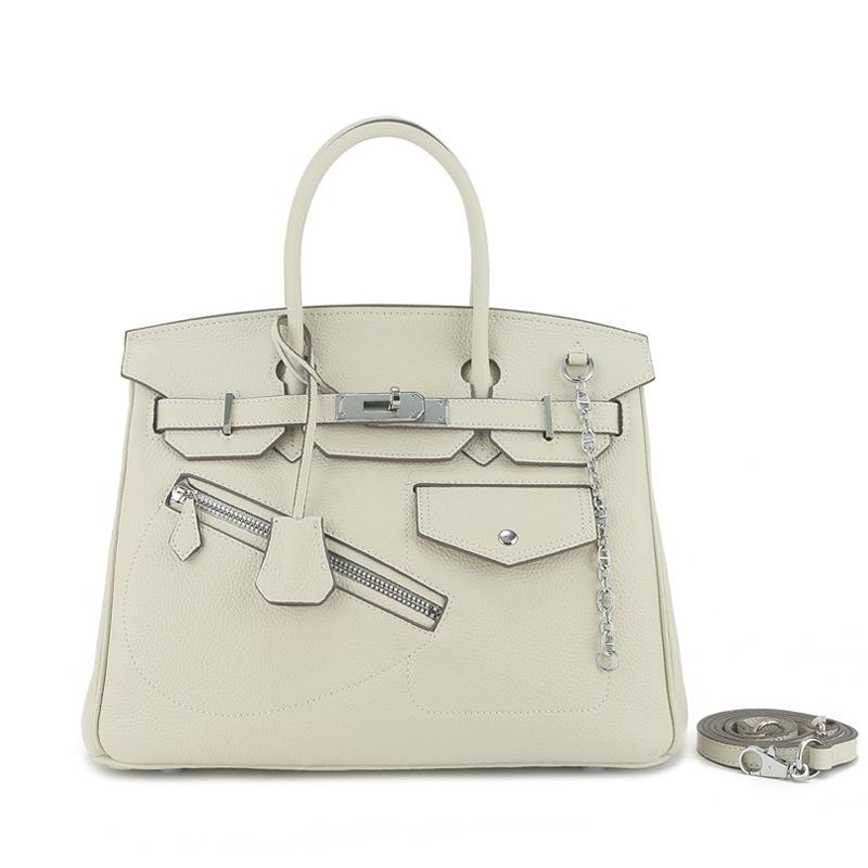 

Genuine Leather Rock Punk Motorcycle Bag High-end Fashionable Versatile Platinum Toe Cover Layer Cowhide Large Capacity Handbag For Women 25x14x19cm білий