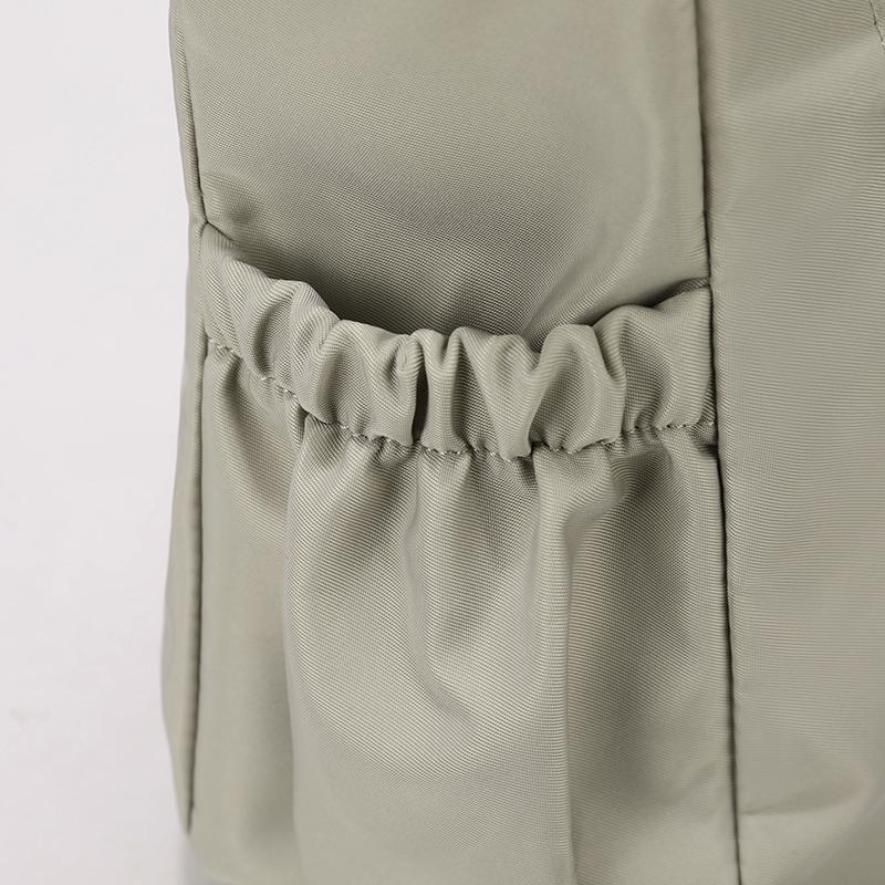 Elegant Slouch Shoulder Bag with Top Zip Closure Adjustable Strap Geometric Stitching and Smooth Nylon Fabric for Modern Daily Wear and Commuting