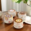 Retro Hand-Painted Ceramic Coffee Cup & Saucer Set with Latte Art Design