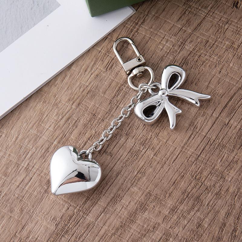 Fashionable Bow Key Pendant with Durable Design for Versatile Use As Keychain or Bag Accessory