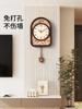 Creative silent light luxury wall clock living room home non-punching clock retro high sense 2025 new wall clock