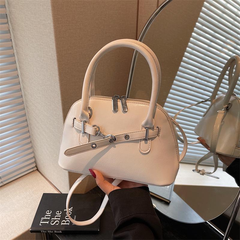 High-End Nischen-Tasche Damen neue vielseitige Umhängetasche Frühling und Sommer tragbare Muscheltasche kleine Tasche