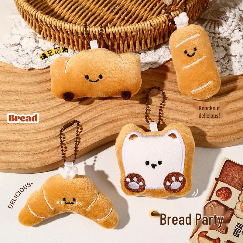 Uroczy breloczek pluszowy croissant - Mała kreskówkowa ozdoba do plecaka