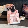 Korean new sweet and fashionable large-capacity bow canvas bag tote bag going out to commute to class shoulder bag women