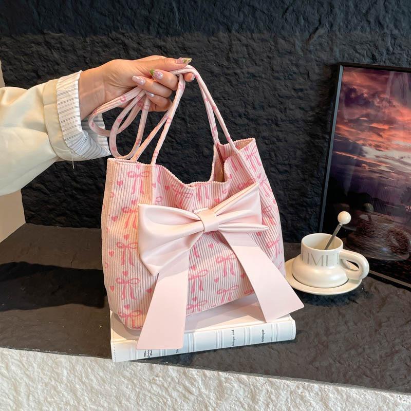 Korean new sweet and fashionable large-capacity bow canvas bag tote bag going out to commute to class shoulder bag women