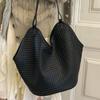 Niche woven bucket bag women's autumn large-capacity casual high-value commuting shoulder armpit bag