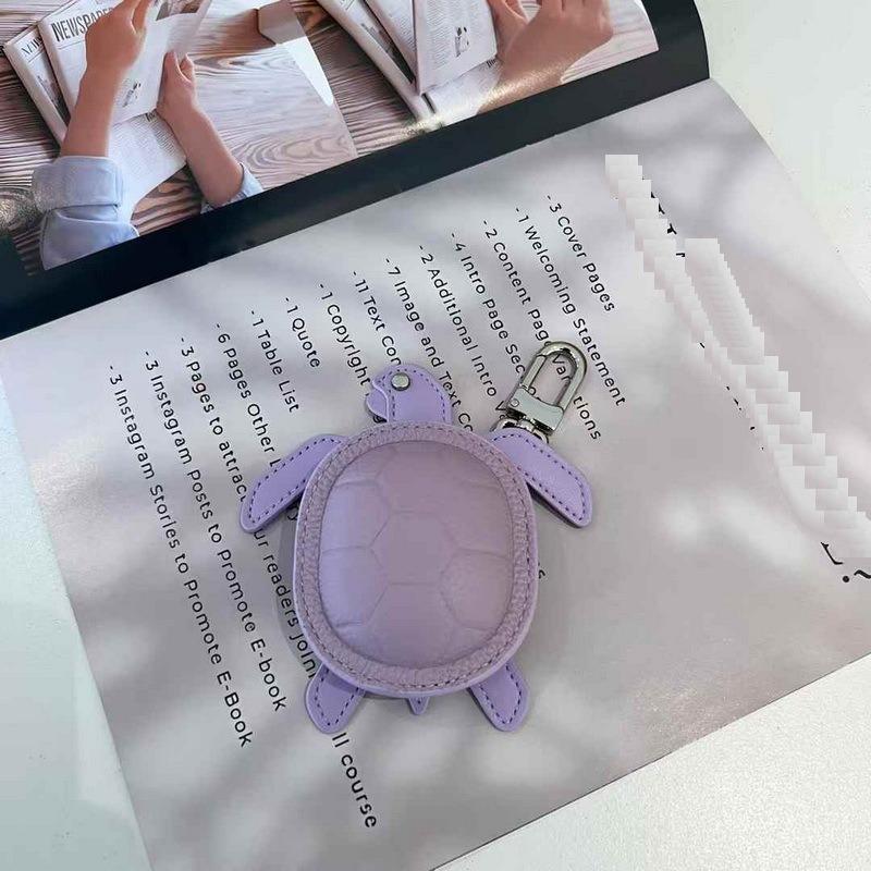 2025 New Leather Pendant Head Layer Leather Mini Earphone Bag Turtle Pendant Wallet Cross Border