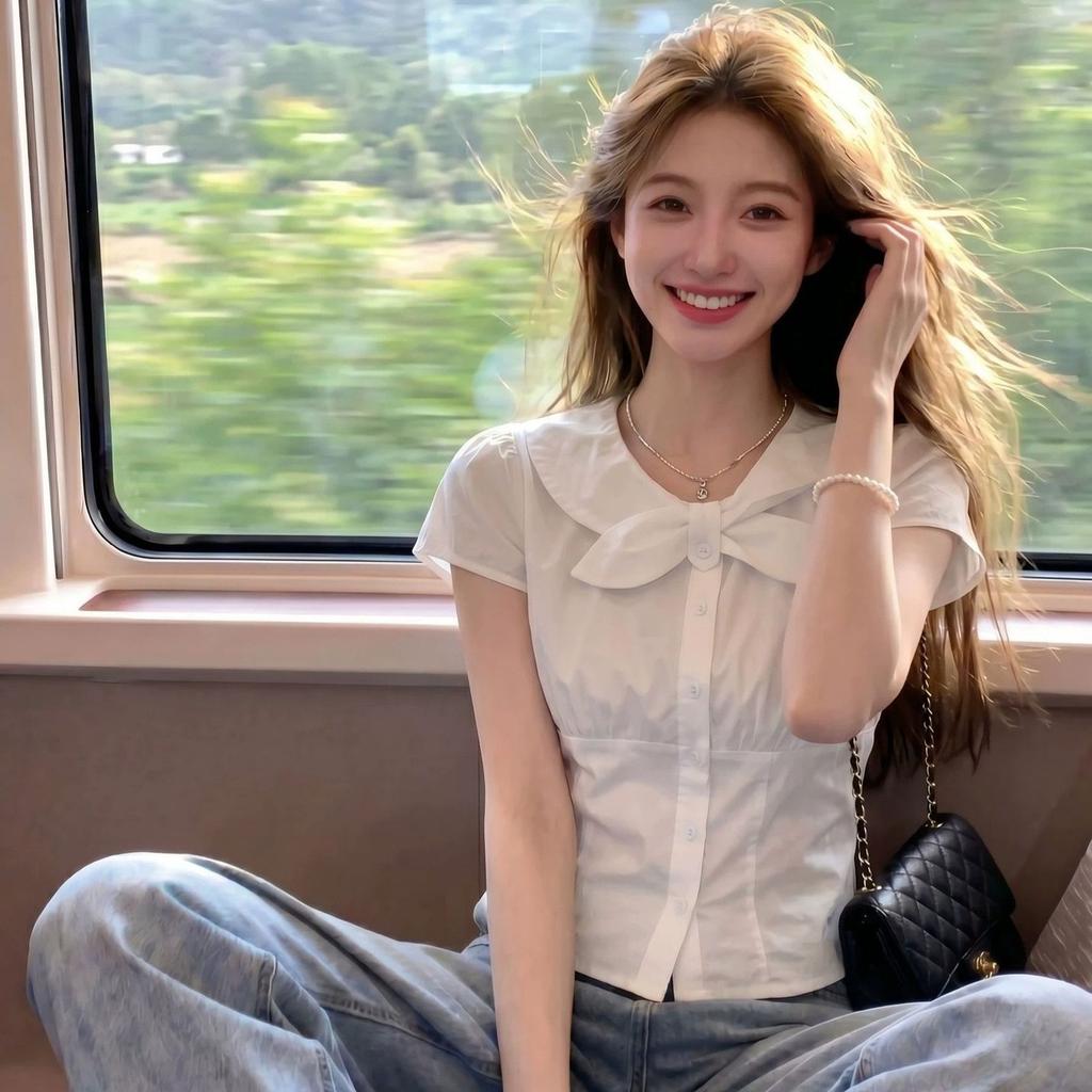 Summer new gentle wind bow short-sleeved white shirt women's design sense waist thin versatile top