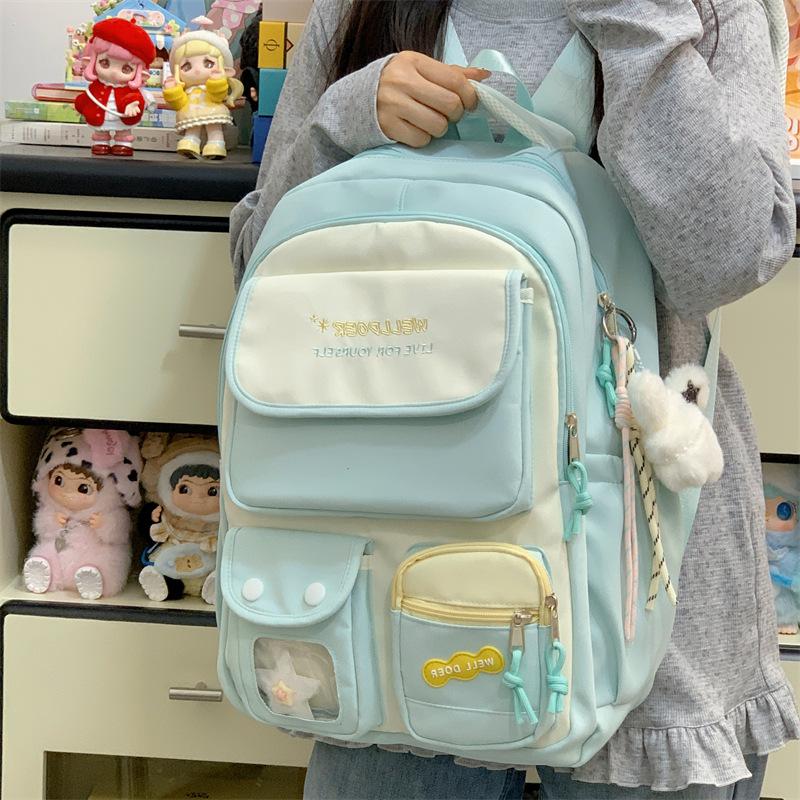 Schoolbag Large capacity schoolbag Girls primary school students High value Small fresh color matching backpack Junior high school students Versatile