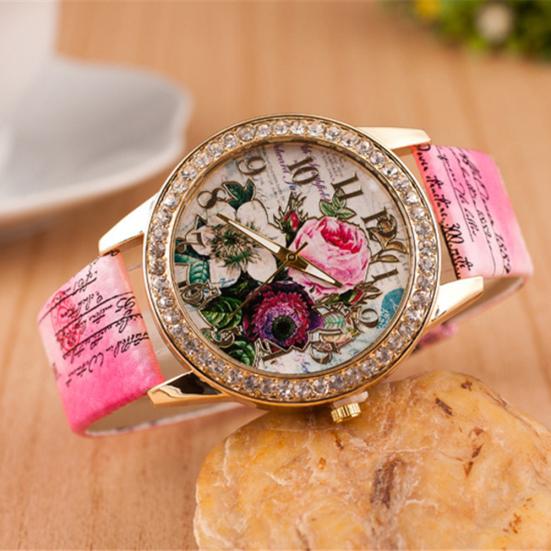 Orologio da polso da donna al quarzo con quadrante rotondo intarsiato di strass a forma di fiore e cinturino in ecopelle
