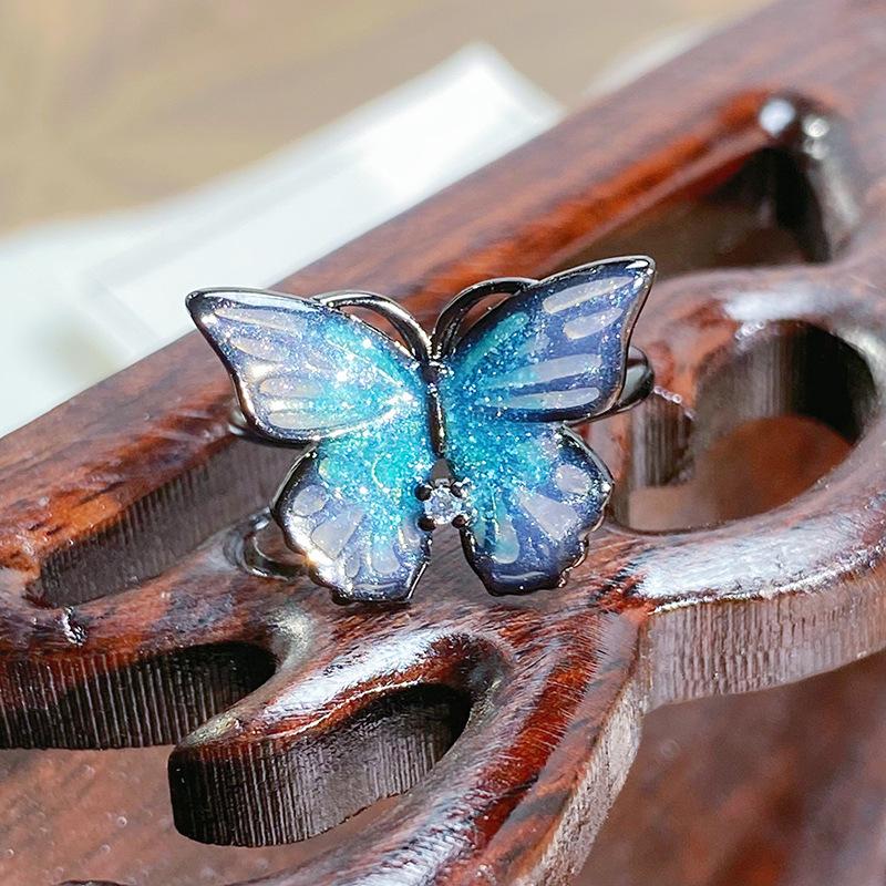 Sweet Cool Gun Black Enamel Dripping Oil Breaking Cocoon Butterfly Dark Opening Ring Design Sense Niche Stacked Ring Woman
