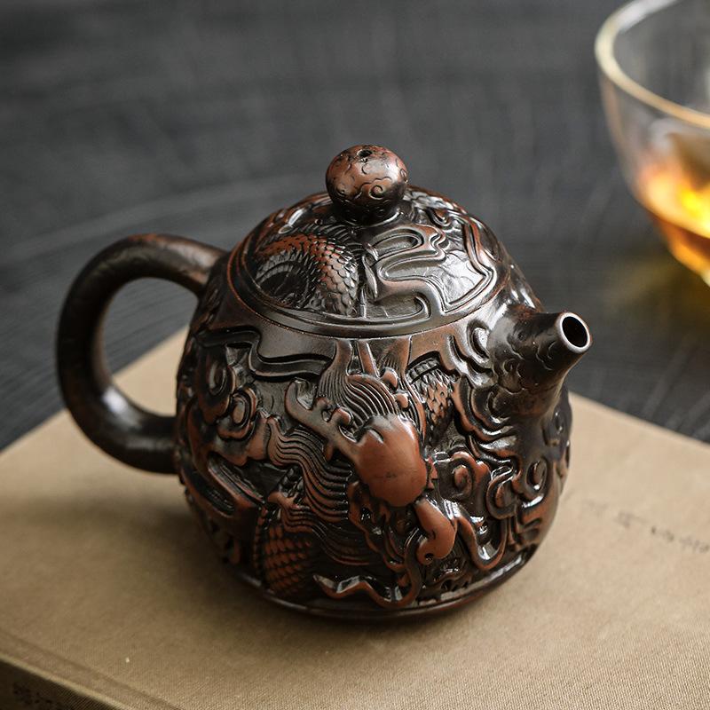 Rotating upside-down aircraft kettle fully carved handmade purple pottery teapot Kung Fu tea set Fengming kettle Xishi teapot
