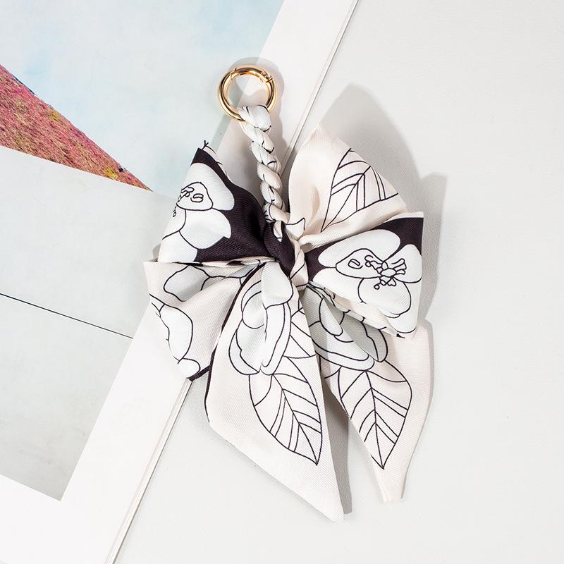 Luxury Bow Chain Bag Charm: Trendy Crossbody Strap and Elegant Pendant Accessory for Influencers