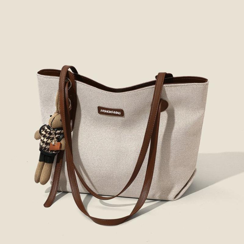 Casual large-capacity bag women's bag spring and summer new versatile canvas bag commuter shoulder bag simple tote bag