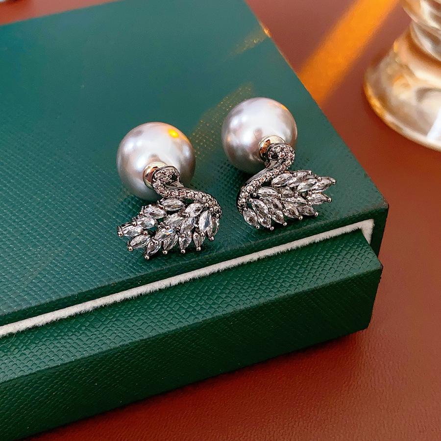 Silbernadel Zirkon Schlangenherz Ohrringe: Elegante, Einzigartige High-End Ohrstecker für Damen