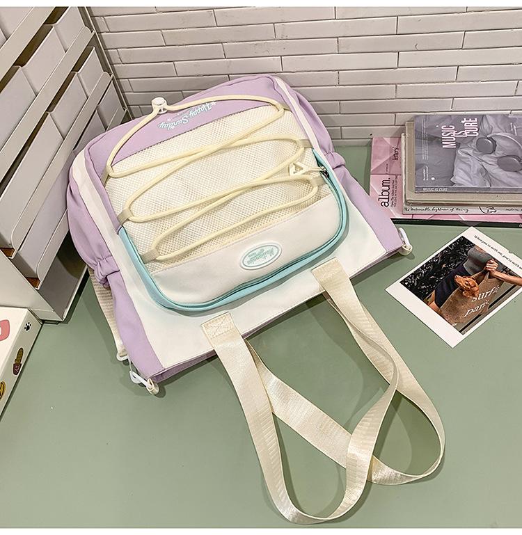 High-value cute primary school student spine care schoolbag female junior high school girl high school student backpack burden reduction