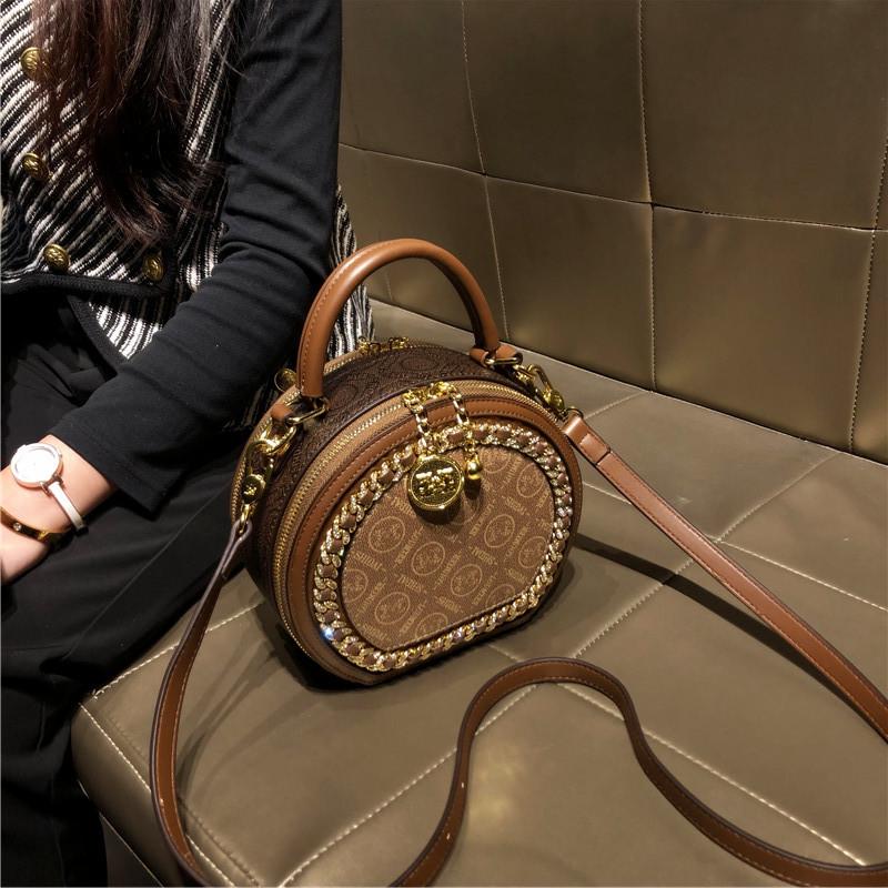 

2025 New Women s Small Round Crossbody Mini Handbag кофейный