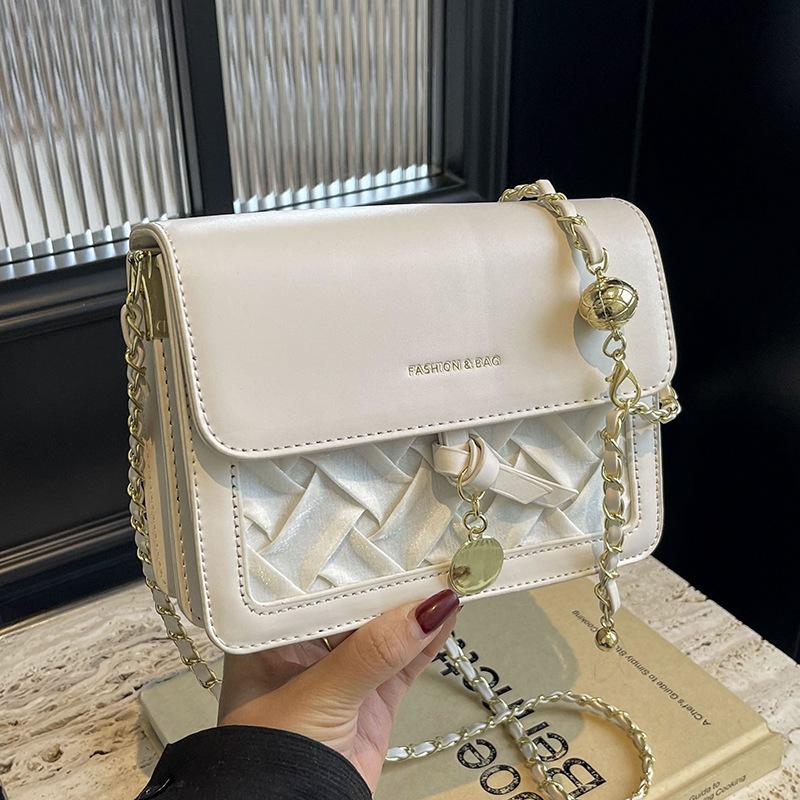 Premium Sinn für leichte Luxus Kontrastfarben Design Sinn gewebte kleine quadratische Tasche Damen Pendeln Temperament einfach Nische Kette Umhängetasche