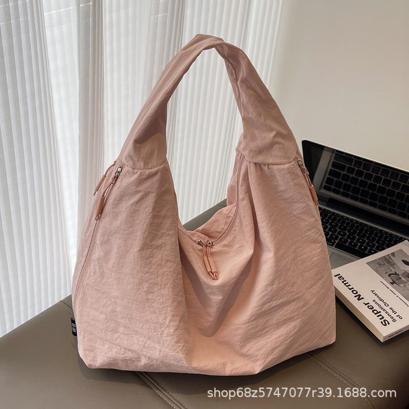 2025 New Large Capacity Versatile Portable Canvas Bag Premium Sense Tote Bag Fashion Commuter Underarm Shoulder Bag Women