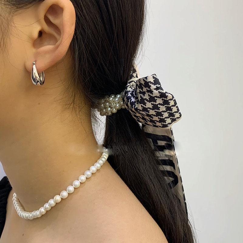 S925 Silber Nadel Ohrringe: Einfache, kalte Ohrschnallen im europäischen und amerikanischen Stil für Damen
